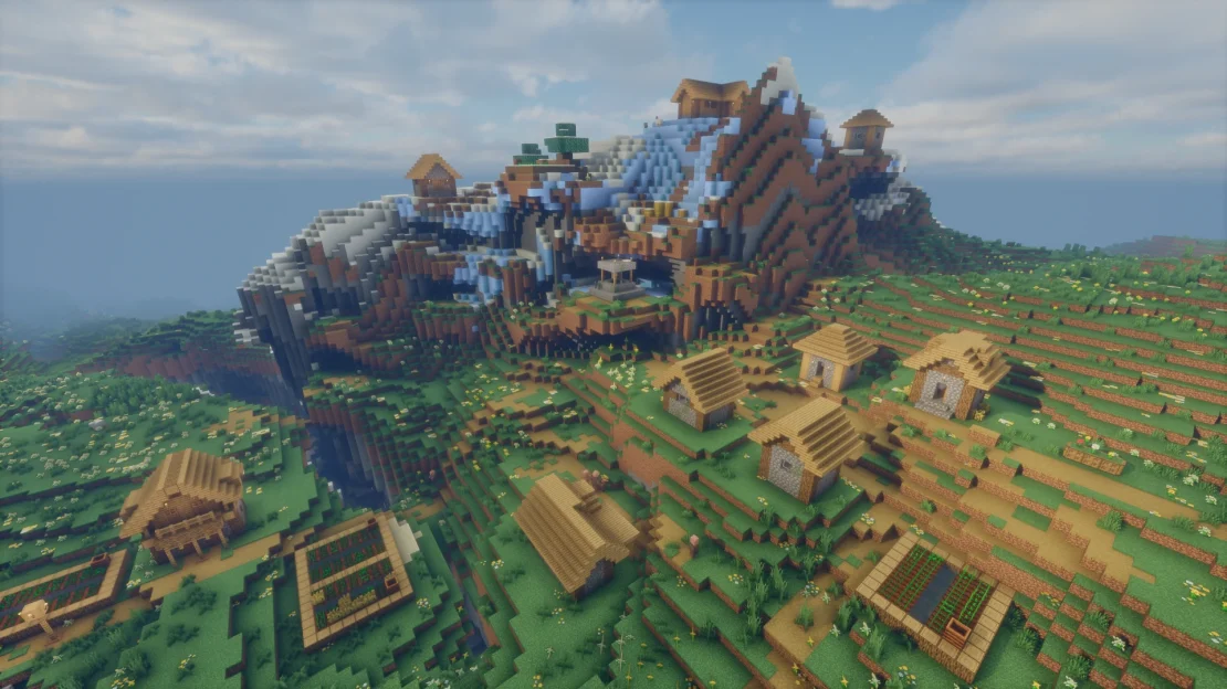 minecraft village near frozen peaks with large ravines