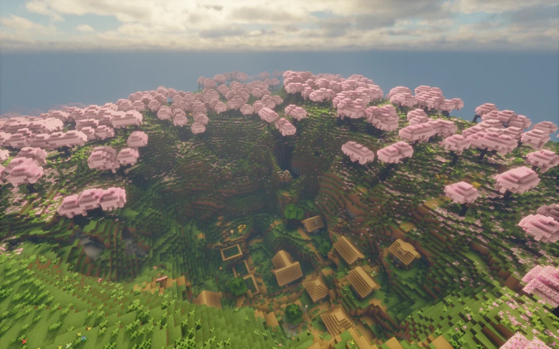 village located in a crater surrounded by cherry trees in minecraft