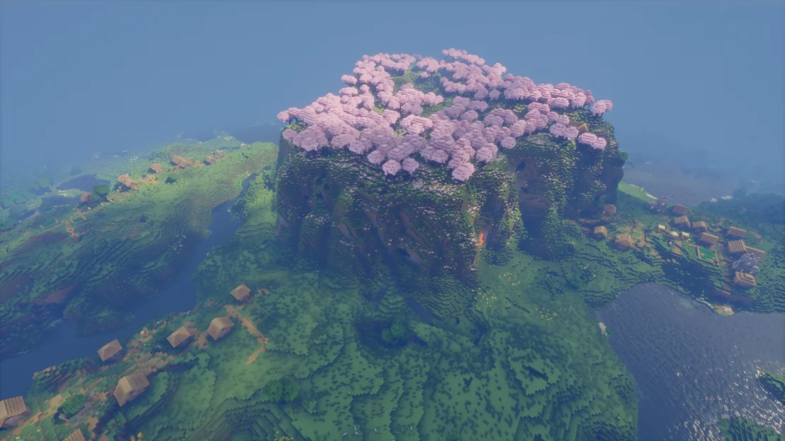 Spawn near a massive Cherry Grove mountain surrounded by 3 villages in Minecraft
