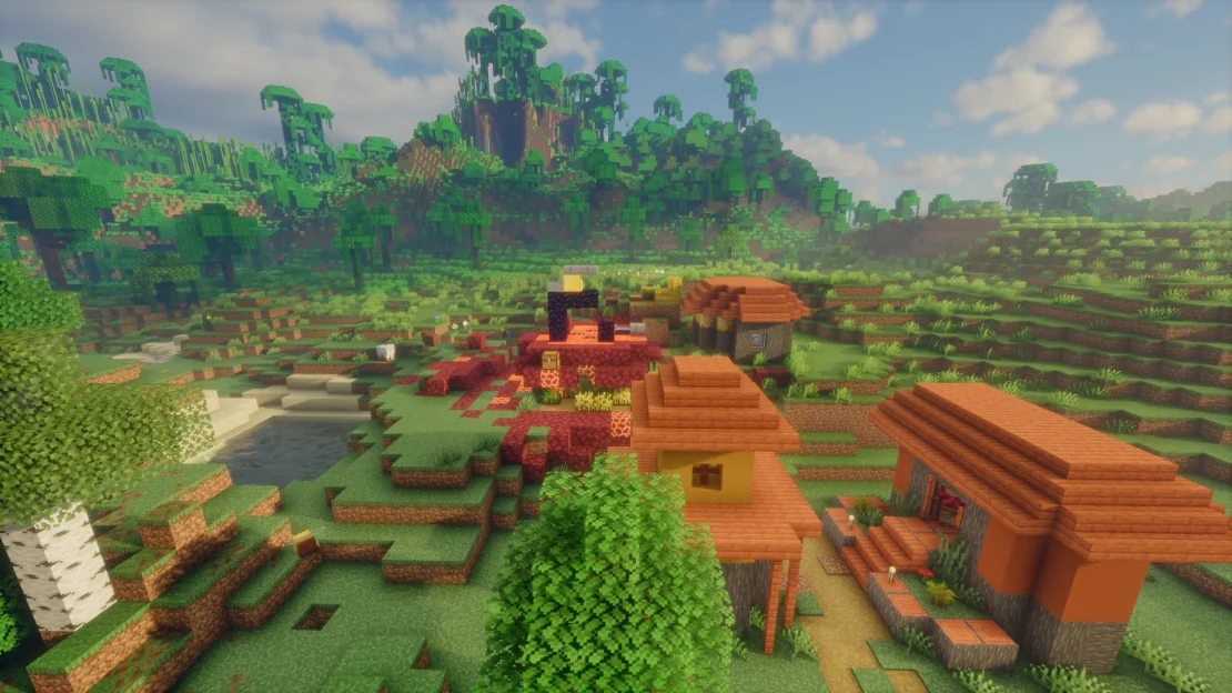 Ruined portal merged with a savanna village near a jungle biome in Minecraft