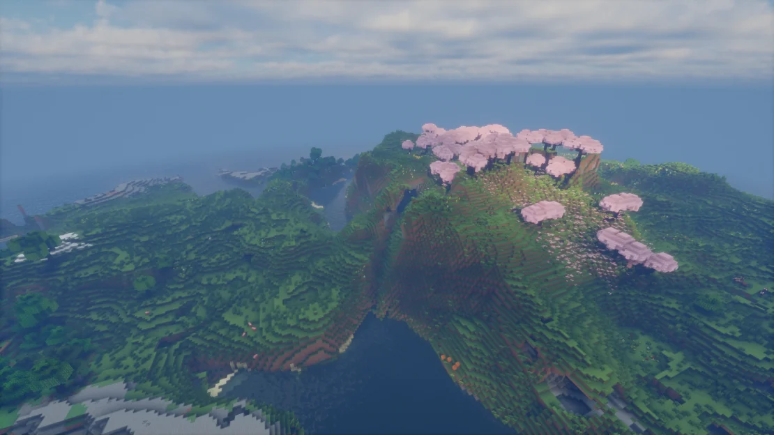 Minecraft cherry grove island with cliffs, waterfalls, and ocean views near spawn
