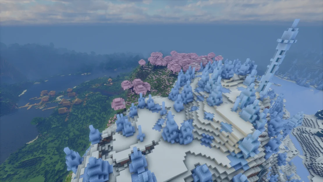 Minecraft village below a mountain with Ice Spikes and Cherry Grove