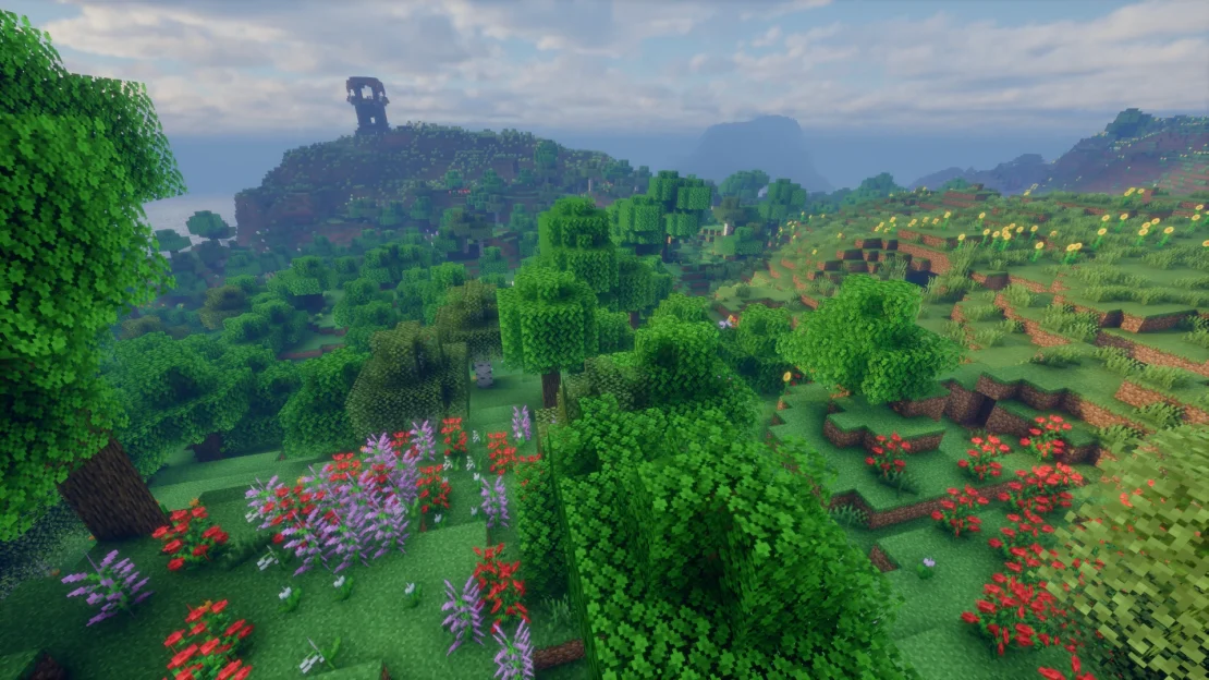 Flower forest biome with a pillager outpost overlooking the surrounding landscape in Minecraft